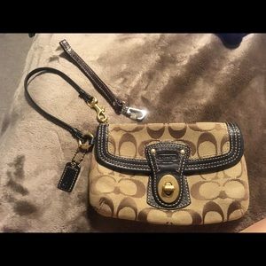 Authentic coach wristlet with spare strap